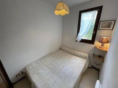 Un ou plusieurs lits dans un hébergement de l'établissement T2 cabine avec balcon, près des pistes - FR-1-787-21