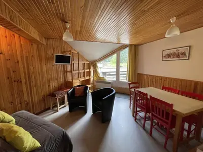 Télévision ou salle de divertissement dans l'établissement Duplex 6/8 pers. avec balcon en plein centre, proche des pistes et commerces - FR-1-787-52