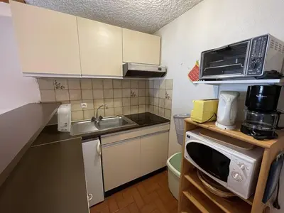 Cuisine ou kitchenette dans l'établissement Duplex 6/8 pers. avec balcon en plein centre, proche des pistes et commerces - FR-1-787-52