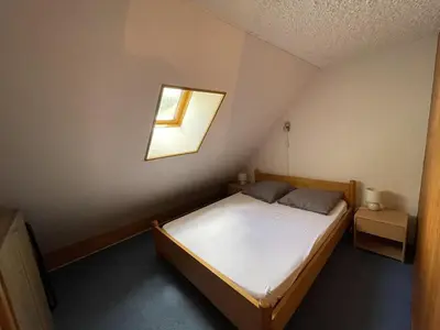 Un ou plusieurs lits dans un hébergement de l'établissement Duplex 6/8 pers. avec balcon en plein centre, proche des pistes et commerces - FR-1-787-52