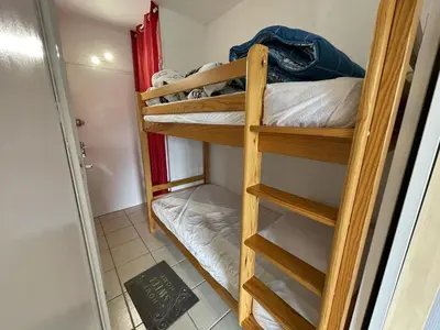 Un ou plusieurs lits dans un hébergement de l'établissement Studio 4 Pers. au Centre de la Station avec Wifi et Animaux Admis - FR-1-787-73