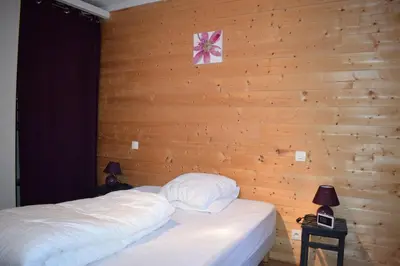 Un ou plusieurs lits dans un hébergement de l'établissement Villa des Lutins