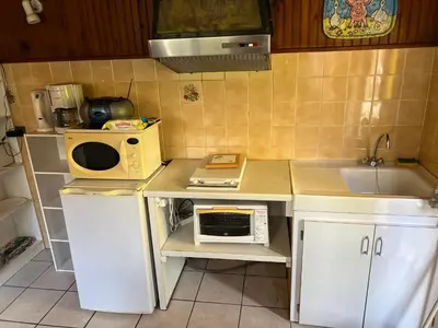 Cuisine ou kitchenette dans l'établissement Agréable studio 2024
