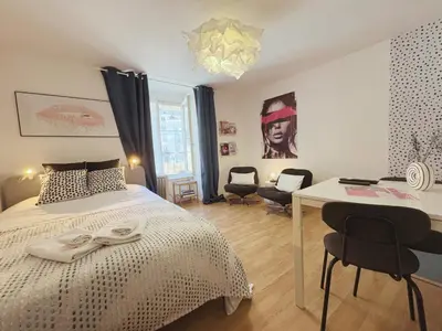 Un ou plusieurs lits dans un hébergement de l'établissement La Bonbonnière Centre ville - Thermes - Netflix