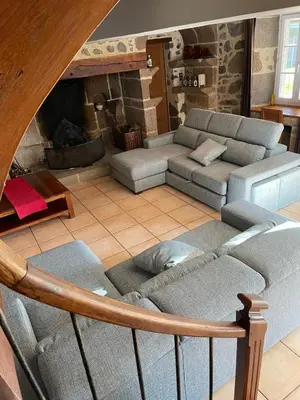 Coin salon dans l'établissement 20 min Lioran, Maison familiale en Auvergne, Nature et Confort,