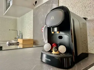 Cuisine ou kitchenette dans l'établissement Studio 4 Rue Théodore Bac - DABNB