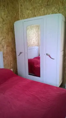 Un ou plusieurs lits dans un hébergement de l'établissement Chalet Le Breuil