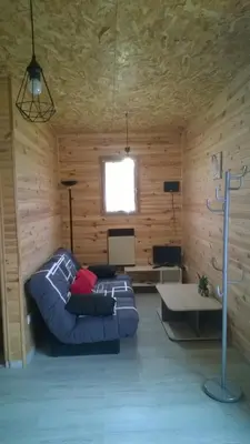 Coin salon dans l'établissement Chalet Le Breuil