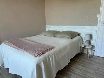 Un ou plusieurs lits dans un hébergement de l'établissement Maison Chez Gilberte à Salers