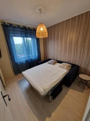 Un ou plusieurs lits dans un hébergement de l'établissement Gîte de la Vergeade