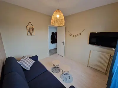 Télévision ou salle de divertissement dans l'établissement Gîte de la Vergeade