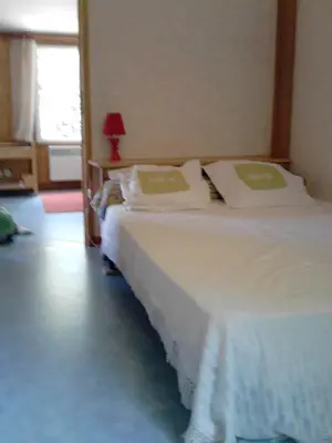 Un ou plusieurs lits dans un hébergement de l'établissement Chalet 3 chambres point de vue depuis la grande terrasse