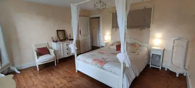 Un ou plusieurs lits dans un hébergement de l'établissement Superbe maison de maître