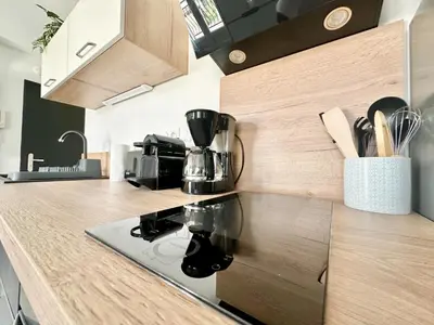 Cuisine ou kitchenette dans l'établissement Le Lemovice, lumineux et calme
