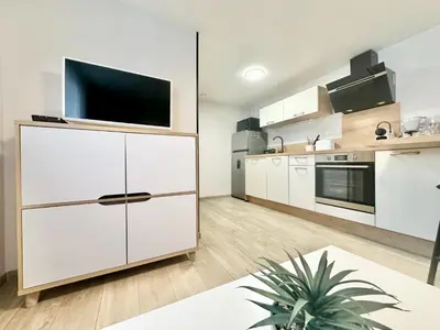 Cuisine ou kitchenette dans l'établissement Le Populaire, cosy et lumineux
