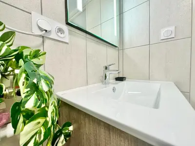 Salle de bains dans l'établissement Le Populaire, cosy et lumineux