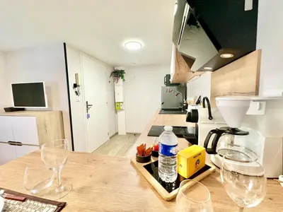 Cuisine ou kitchenette dans l'établissement Le Populaire, cosy et lumineux