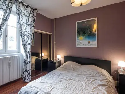 Un ou plusieurs lits dans un hébergement de l'établissement Appartement duplex le montagne de la villa Chanterive