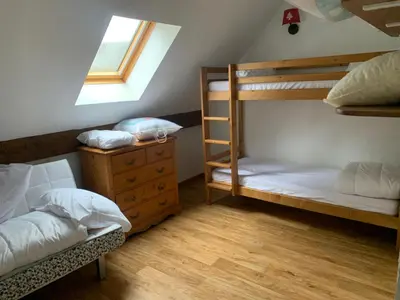 Un ou plusieurs lits dans un hébergement de l'établissement Appartement dans Résidence Bois de la Reine, Besse et Saint Anastaise