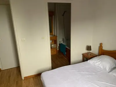 Un ou plusieurs lits dans un hébergement de l'établissement Appartement dans Résidence Bois de la Reine, Besse et Saint Anastaise