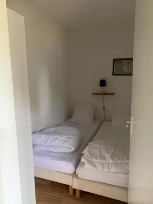 Un ou plusieurs lits dans un hébergement de l'établissement Appartement dans Résidence Bois de la Reine, Besse et Saint Anastaise