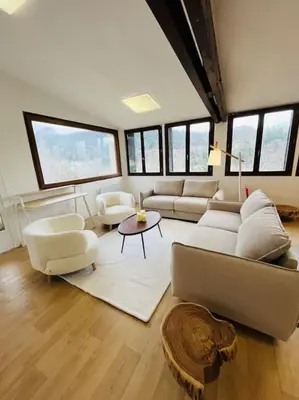 Coin salon dans l'établissement Appartement Le Romy Vue Montagne