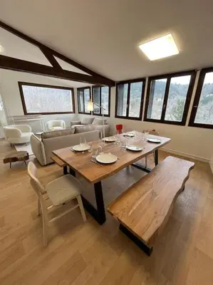 Coin salon dans l'établissement Appartement Le Romy Vue Montagne