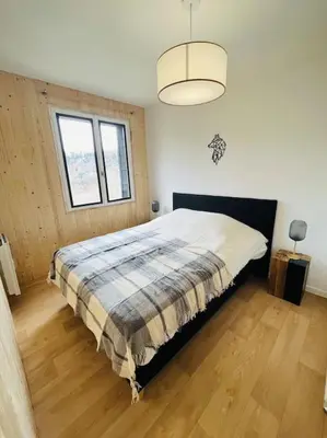 Un ou plusieurs lits dans un hébergement de l'établissement Appartement Le Romy Vue Montagne