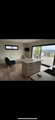 Coin salon dans l'établissement Appartement avec un agréable point de vue et quartier calme