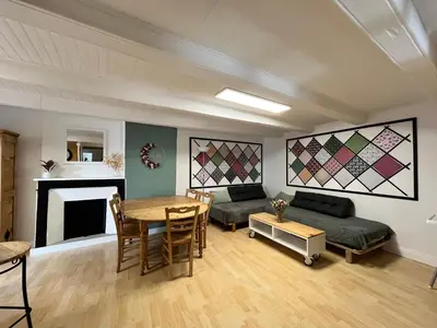 Coin salon dans l'établissement Appartement Florette