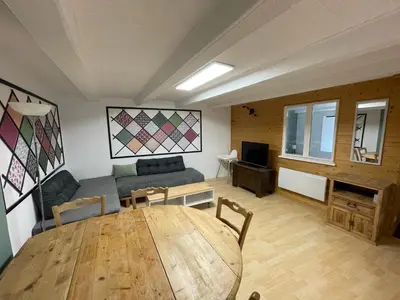 Télévision ou salle de divertissement dans l'établissement Appartement Florette