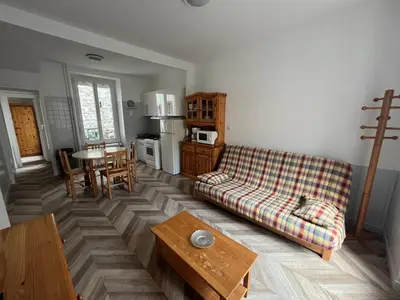 Coin salon dans l'établissement Altitude Location Montagne Appartement 45