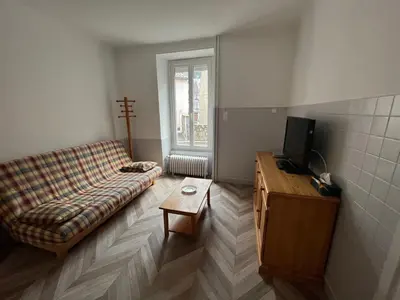 Télévision ou salle de divertissement dans l'établissement Altitude Location Montagne Appartement 45