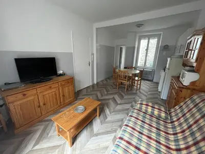 Télévision ou salle de divertissement dans l'établissement Altitude Location Montagne Appartement 45