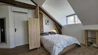 Un ou plusieurs lits dans un hébergement de l'établissement Maison Saint Surin, Climatisation-Cosy