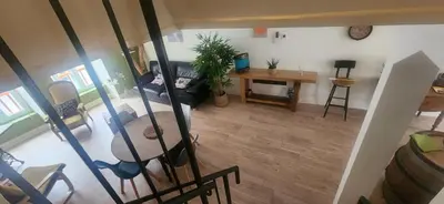 Coin salon dans l'établissement Maison de village