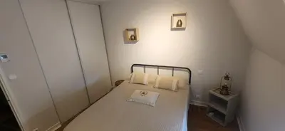 Un ou plusieurs lits dans un hébergement de l'établissement Maison de village