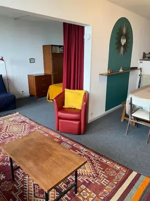 Coin salon dans l'établissement Appartement à la montagne
