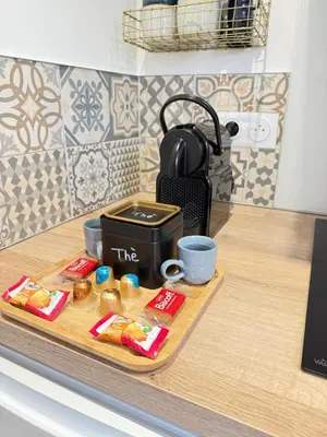 Cuisine ou kitchenette dans l'établissement La Chambrote - Maison cosy avec spa privatif