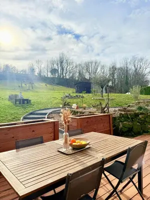 Jardin de l'établissement La Chambrote - Maison cosy avec spa privatif