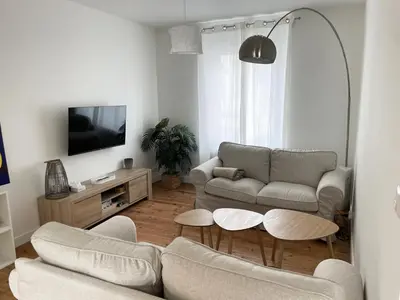Télévision ou salle de divertissement dans l'établissement Appartement Louison jusqu'à 4 personnes