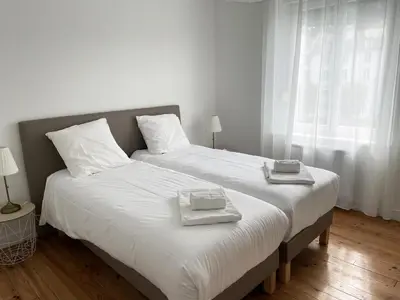 Un ou plusieurs lits dans un hébergement de l'établissement Appartement Louison jusqu'à 4 personnes