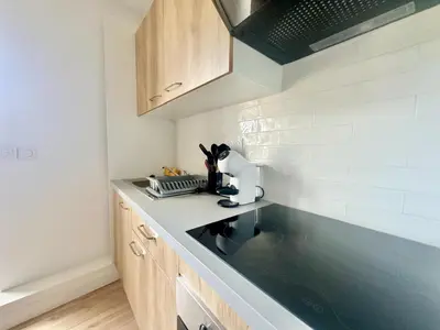 Cuisine ou kitchenette dans l'établissement L'Alpha, Moderne et lumineux