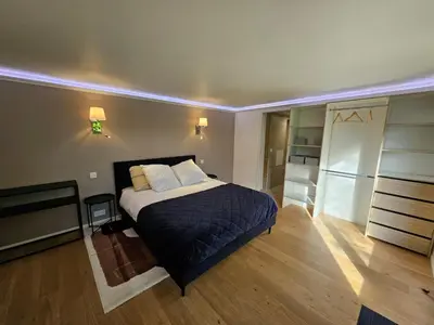 Un ou plusieurs lits dans un hébergement de l'établissement Charmante Maisonette du Lot rénovée avec balnéo