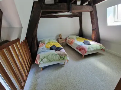 Un ou plusieurs lits dans un hébergement de l'établissement Château de Sérignac