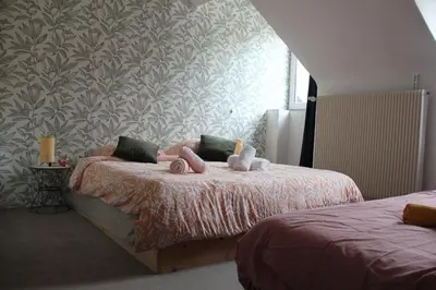 Un ou plusieurs lits dans un hébergement de l'établissement Villa Antoinette