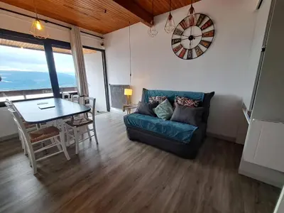 Coin salon dans l'établissement Appartement duplex avec vue sur le Sancy et garage couvert