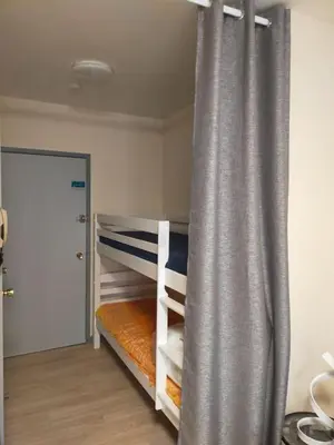 Un ou plusieurs lits dans un hébergement de l'établissement Studio 1 - Mont Dore face aux Thermes - Hyper-Centre