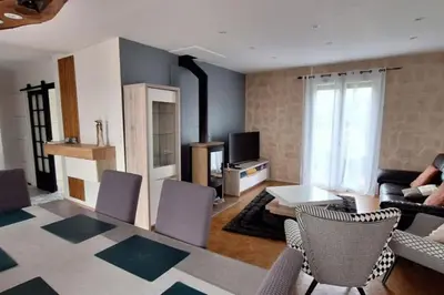 Coin salon dans l'établissement Charmante maison de ville climatisée avec Wifi