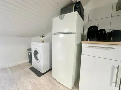 Cuisine ou kitchenette dans l'établissement Les Bancs, central et calme